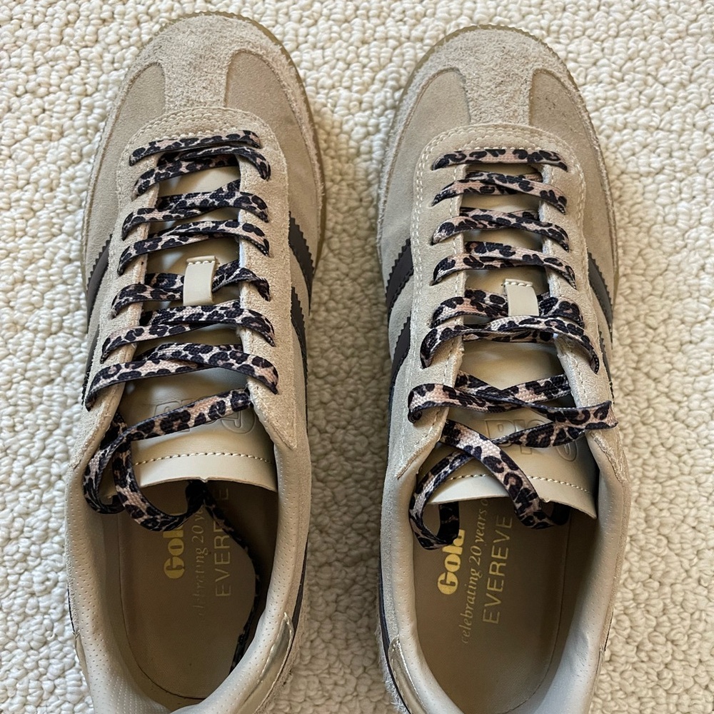 Gola Beige Sneakers with leopard print shoelaces.